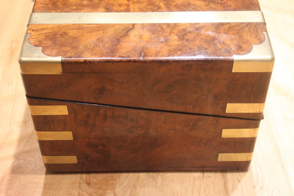 A quality walnut writing slope with stationery compartments, secret drawers etc. View IV