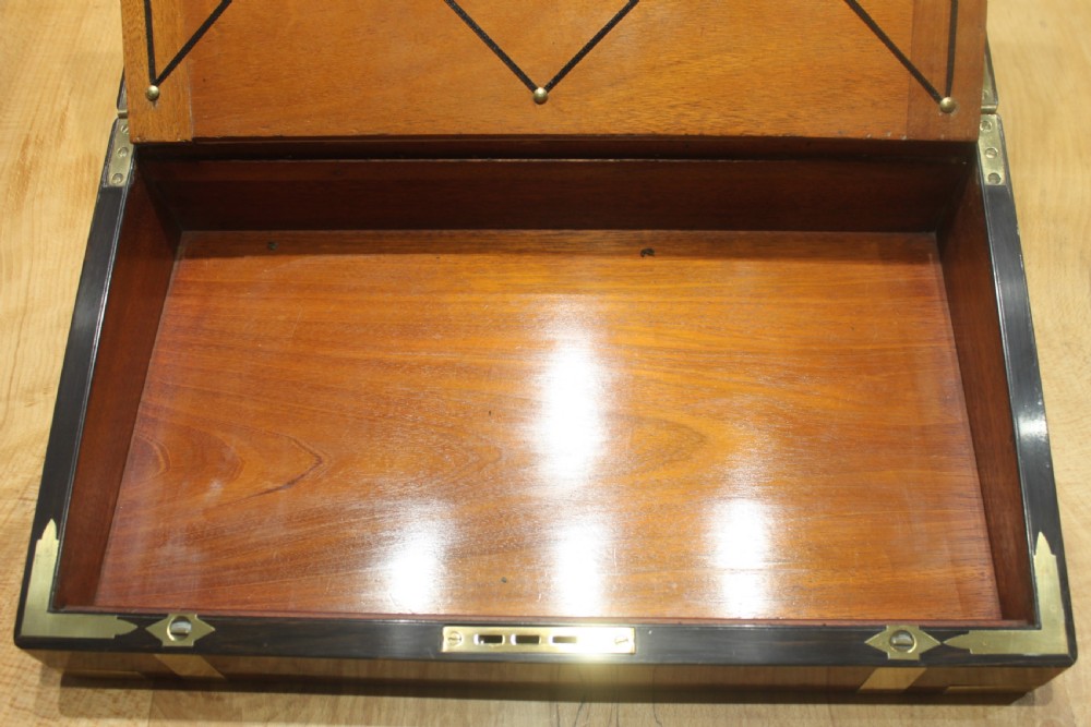 A quality walnut writing slope with stationery compartments, secret drawers etc. View VIII