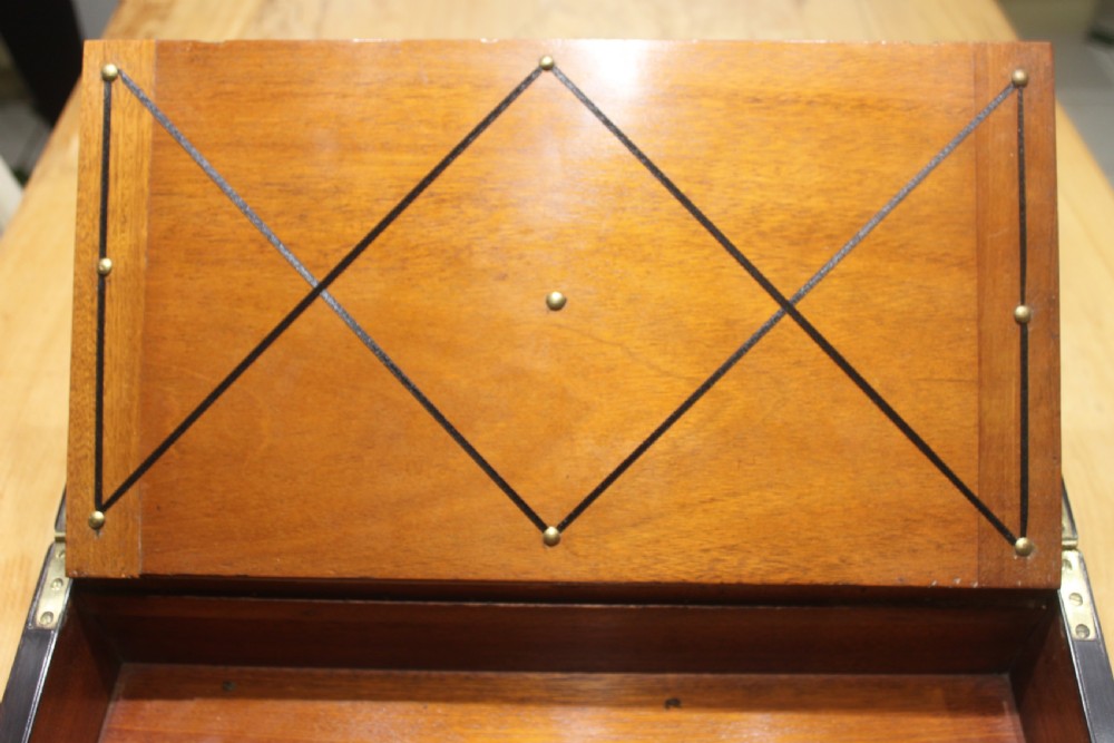 A quality walnut writing slope with stationery compartments, secret drawers etc. View IX
