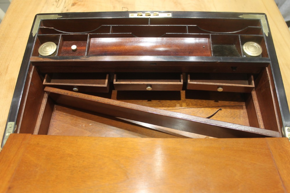 A quality walnut writing slope with stationery compartments, secret drawers etc. View XII