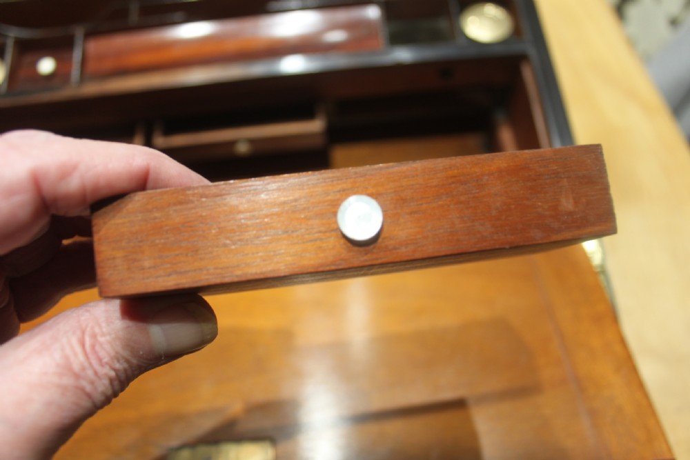 A quality walnut writing slope with stationery compartments, secret drawers etc. View XIII
