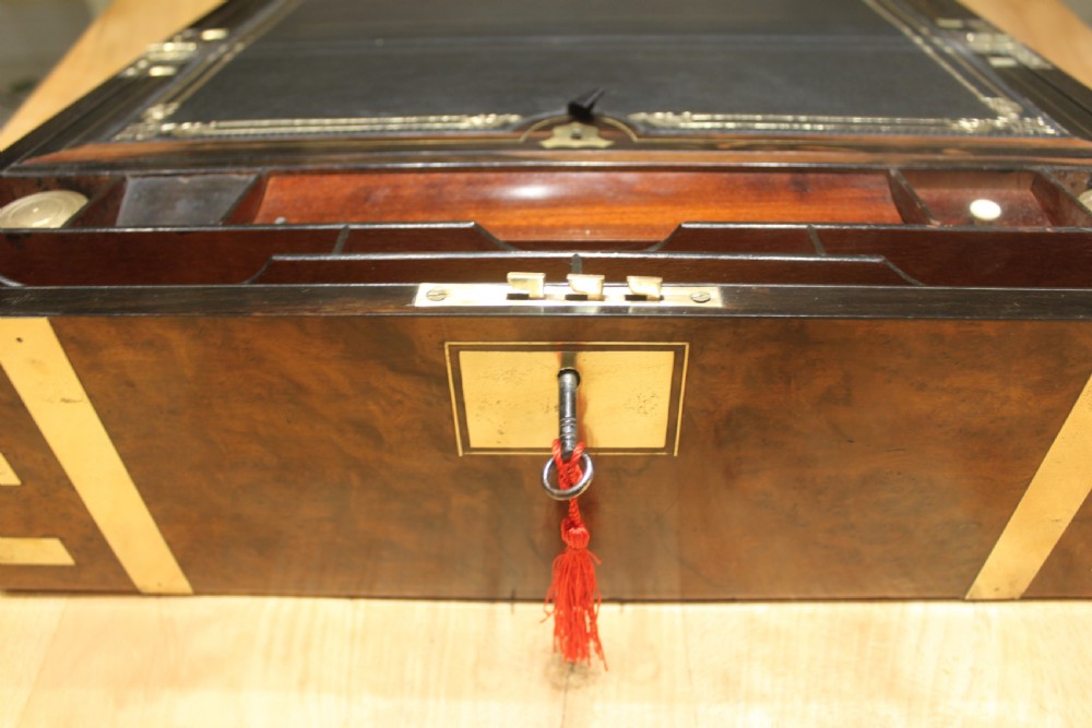 A quality walnut writing slope with stationery compartments, secret drawers etc. View XIV