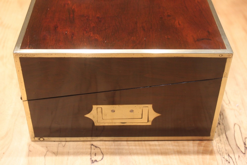 A Brass Bound Writing Slope with a fitted interior to include Inkwells, Pen...	 View IV