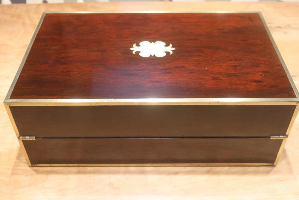 A Brass Bound Writing Slope with a fitted interior to include Inkwells, Pen...	 View V