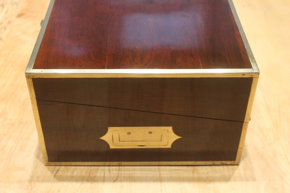 A Brass Bound Writing Slope with a fitted interior to include Inkwells, Pen...	 View VI