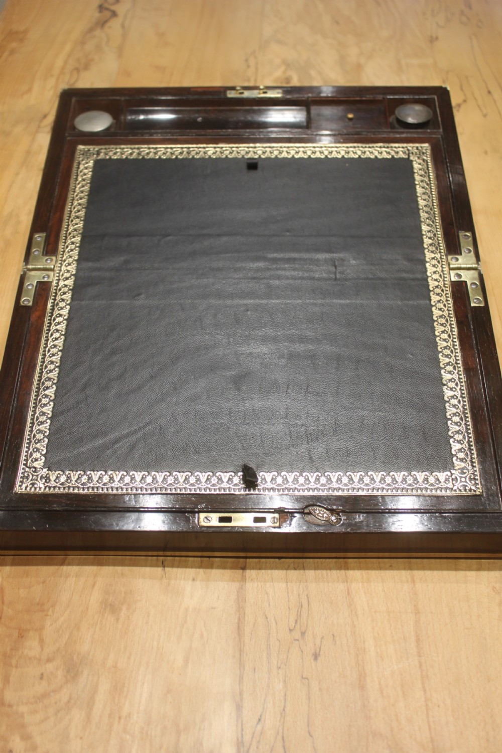 A Brass Bound Writing Slope with a fitted interior to include Inkwells, Pen...	 View VII