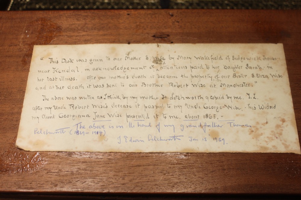 A Brass Bound Writing Slope with a fitted interior to include Inkwells, Pen...	 View XI
