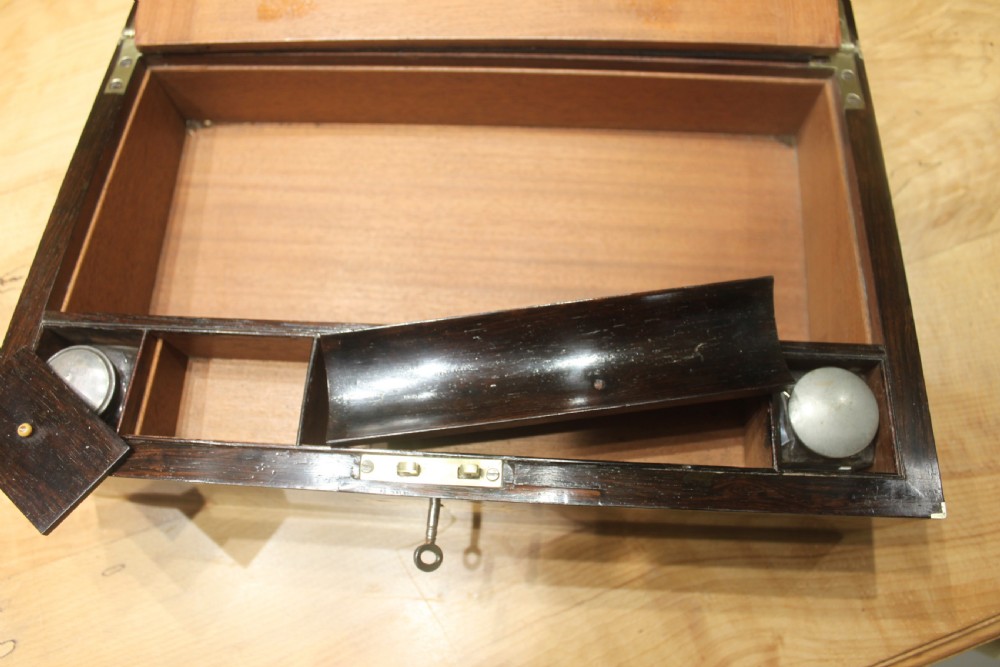 A Brass Bound Writing Slope with a fitted interior to include Inkwells, Pen...	 View XII