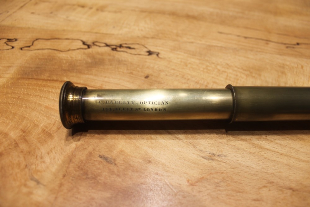 A brass pocket telescope by C Barrett, London View II