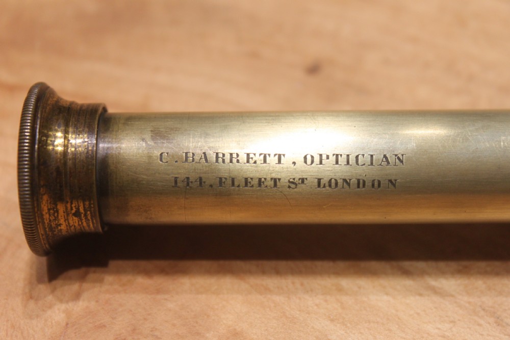 A brass pocket telescope by C Barrett, London View III