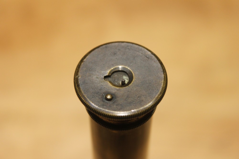 A brass pocket telescope by C Barrett, London View IV