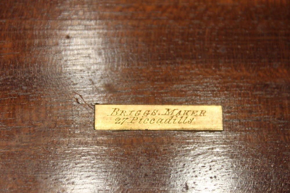 A rectangular dark coromandel wood writing slope box decorated with ornate Gothic Revival brass corner mounts and central brass straps. View XII