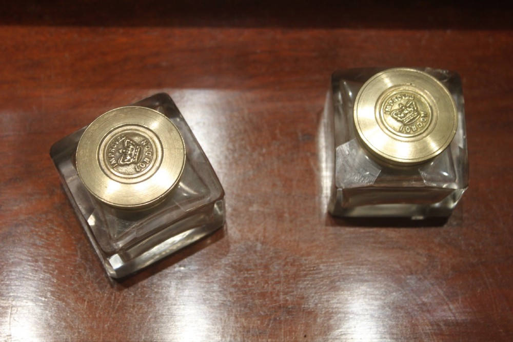 A rectangular antique burr walnut writing slope with an inlaid central cartouche and a brass circular Bramah lock on the front face. View XVI