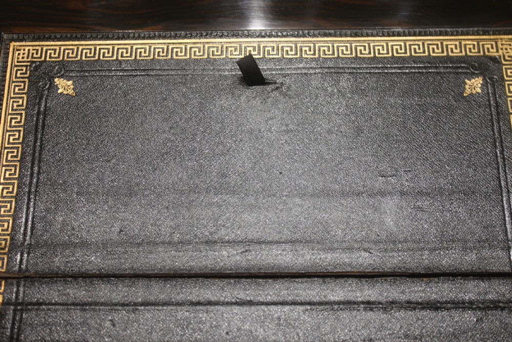 A dark walnut rectangular writing slope with brass edge binding, an inset brass plaque on top, and a brass escutcheon with key. View XIII