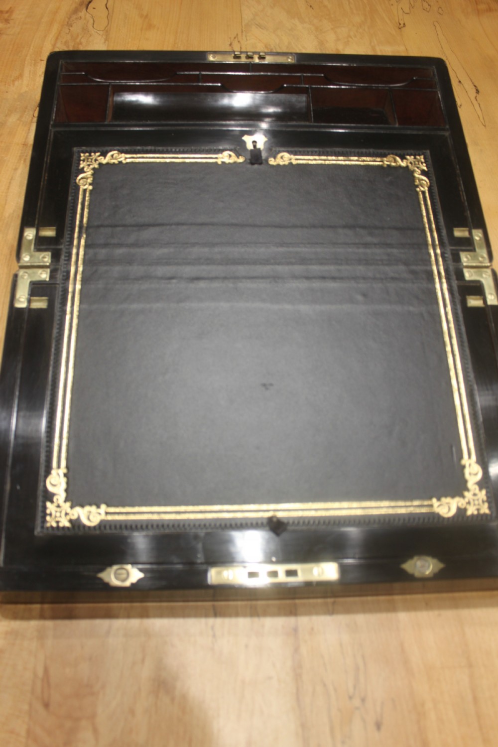 A quality late 19th century Coromandel and brass bound writing slope View VI