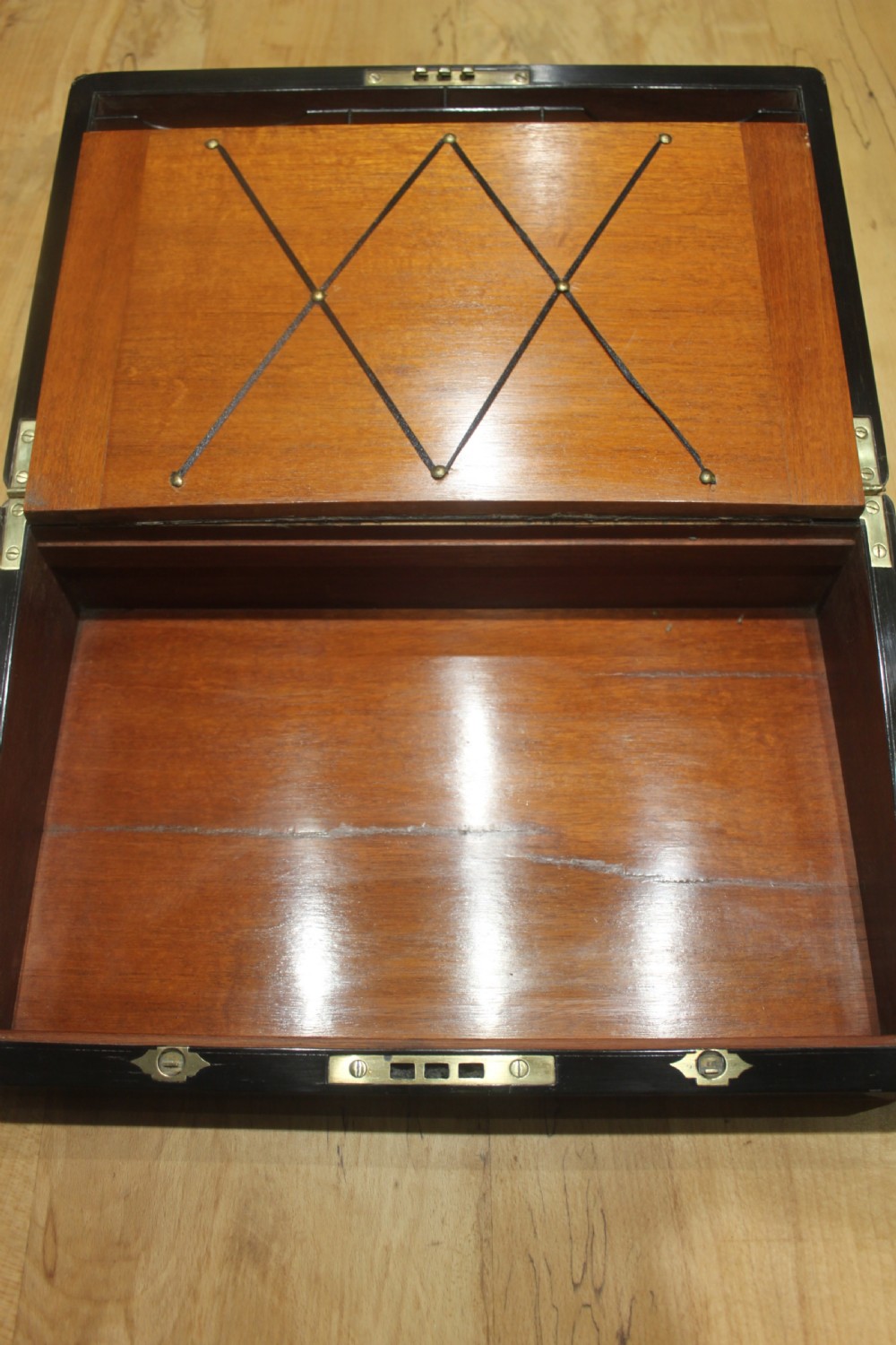 A quality late 19th century Coromandel and brass bound writing slope View XI
