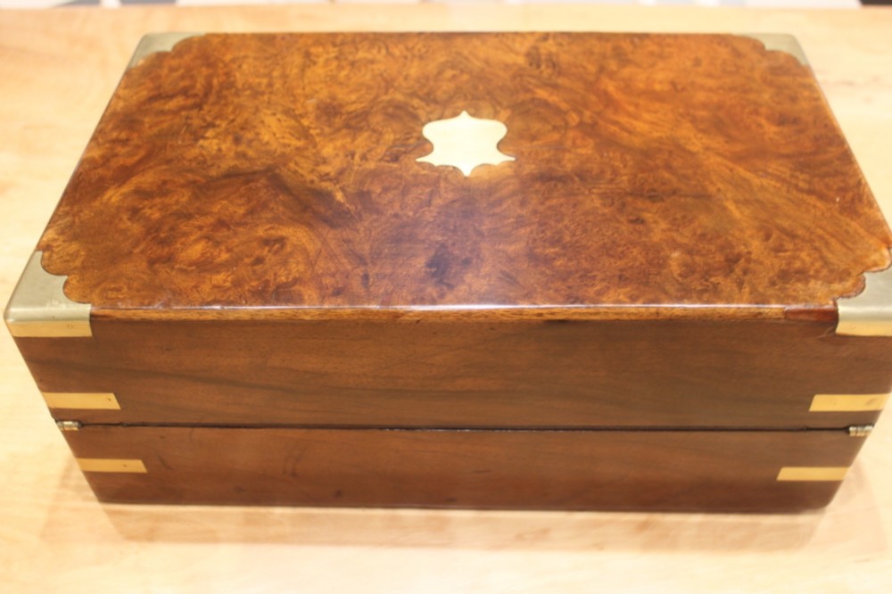 A Victorian burr walnut writing slope with secret drawers View III
