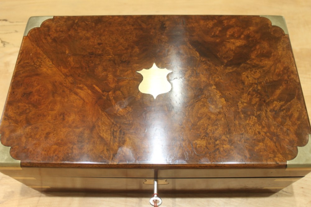 A Victorian burr walnut writing slope with secret drawers View V