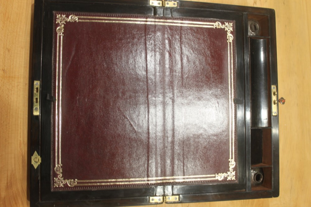 A Victorian burr walnut writing slope with secret drawers View VI