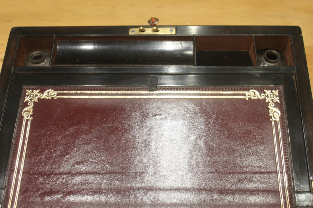 A Victorian burr walnut writing slope with secret drawers View VII