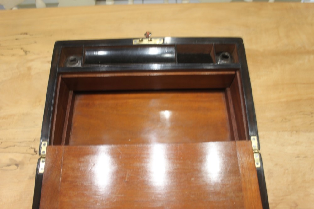 A Victorian burr walnut writing slope with secret drawers View IX