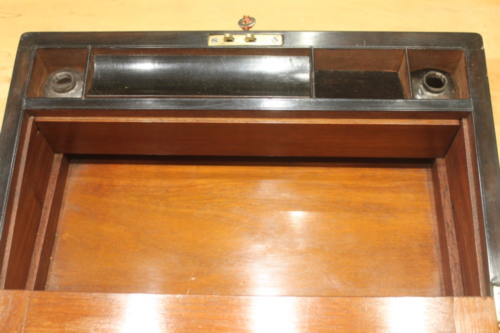 A Victorian burr walnut writing slope with secret drawers View X
