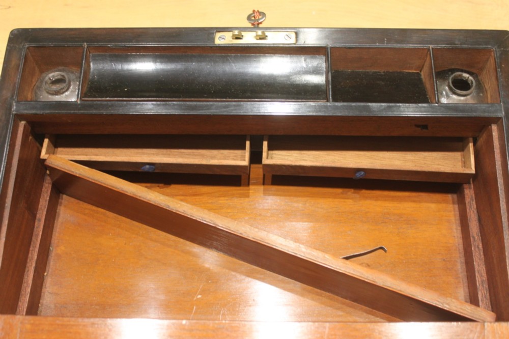 A Victorian burr walnut writing slope with secret drawers View XI