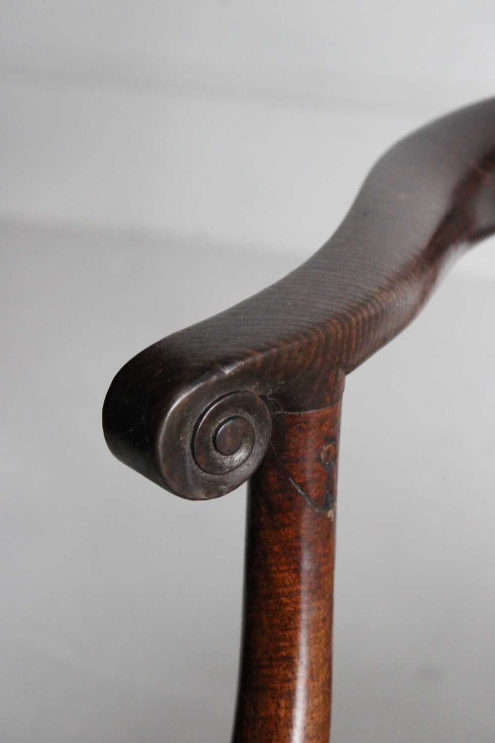 A Georgian dark mahogany open armchair featuring a pierced lattice back splat, curved arms, and a green upholstered seat. View VIII
