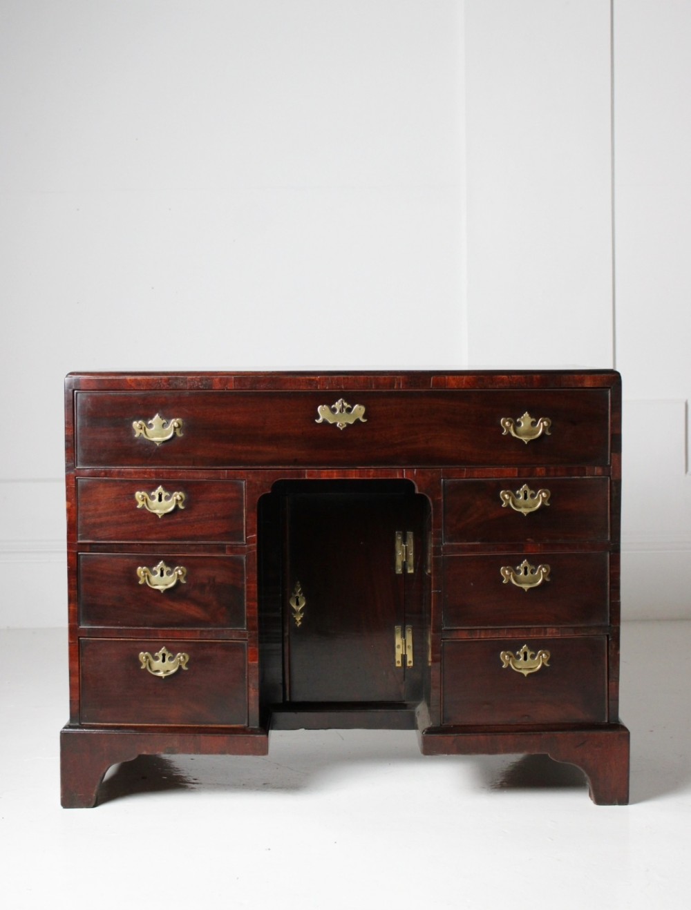 George II red walnut kneehole desk
