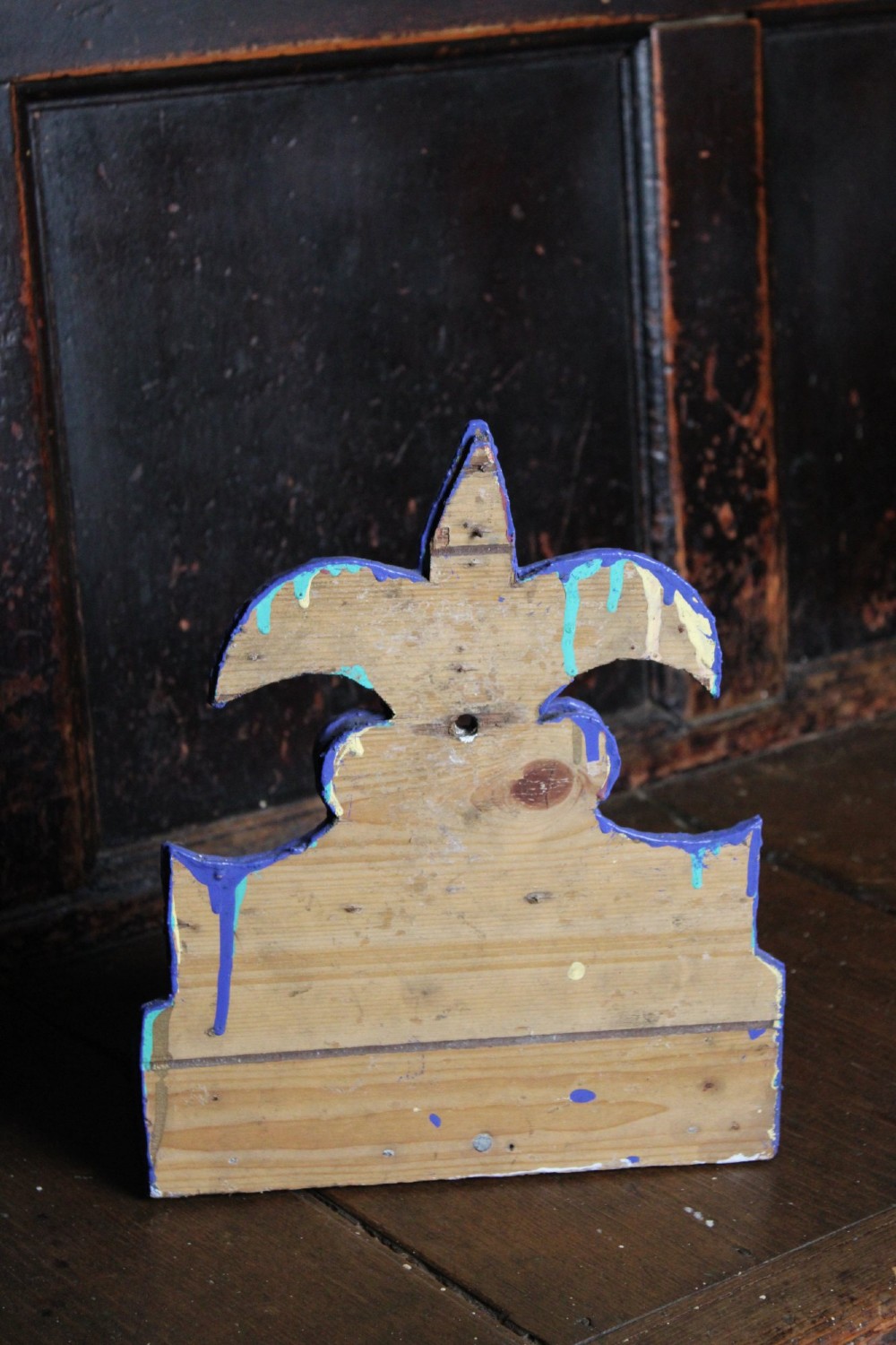 A pair of notch-carved wooden tramp art wall boxes painted in vivid blue with geometric chip-carved layers and crown pediments. View III