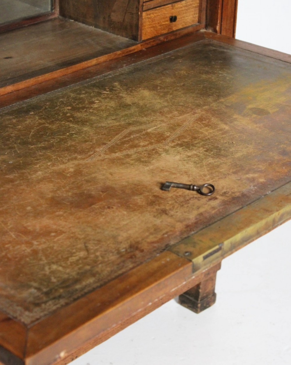 A tall 19th-century fruitwood secretaire cabinet featuring a glazed double-door upper section, a fall-front writing flap, and three long drawers below. View IV