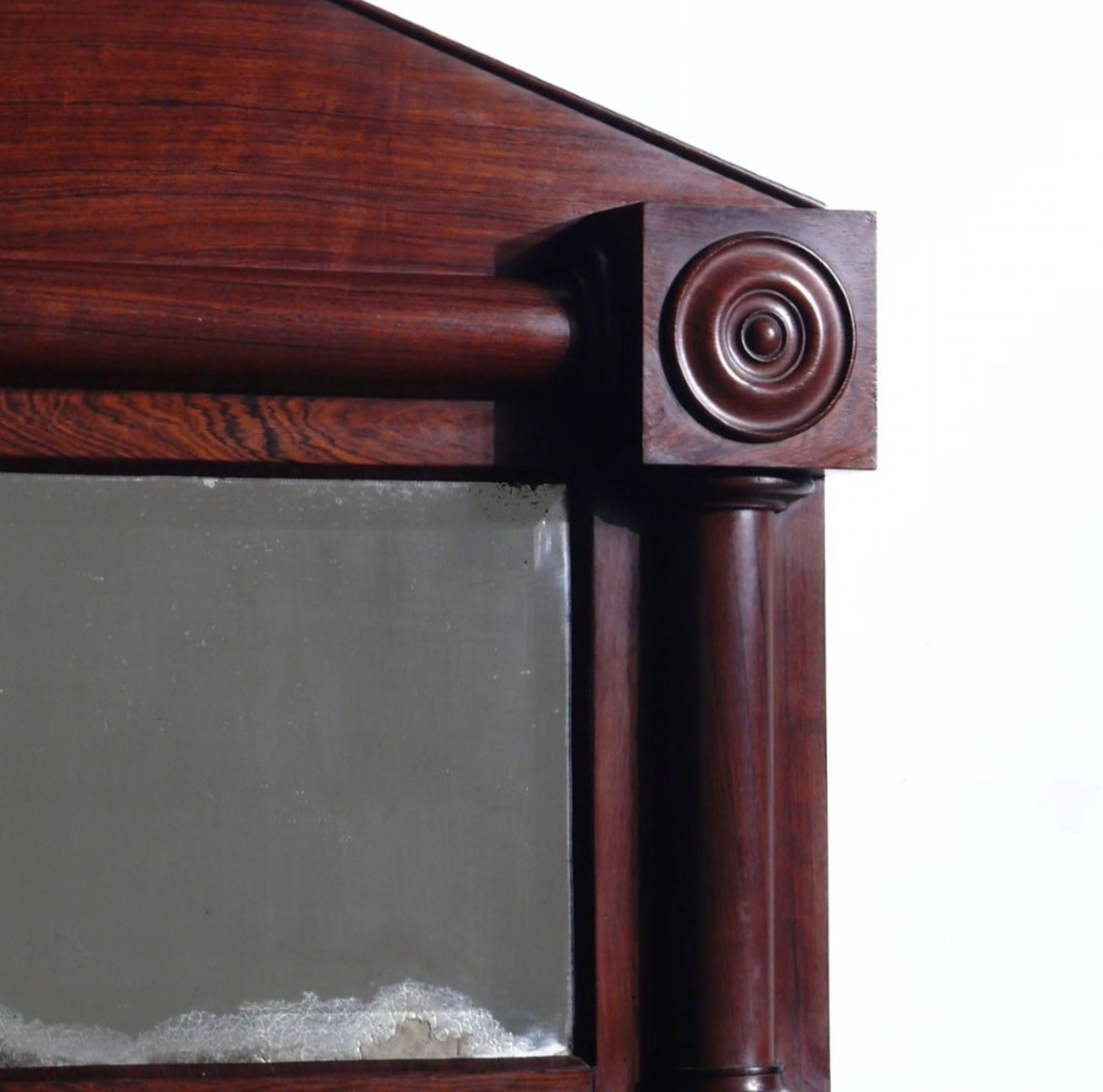 A 19th-century rosewood overmantel mirror featuring a pediment top and turned side columns with carved roundel capitals. View III