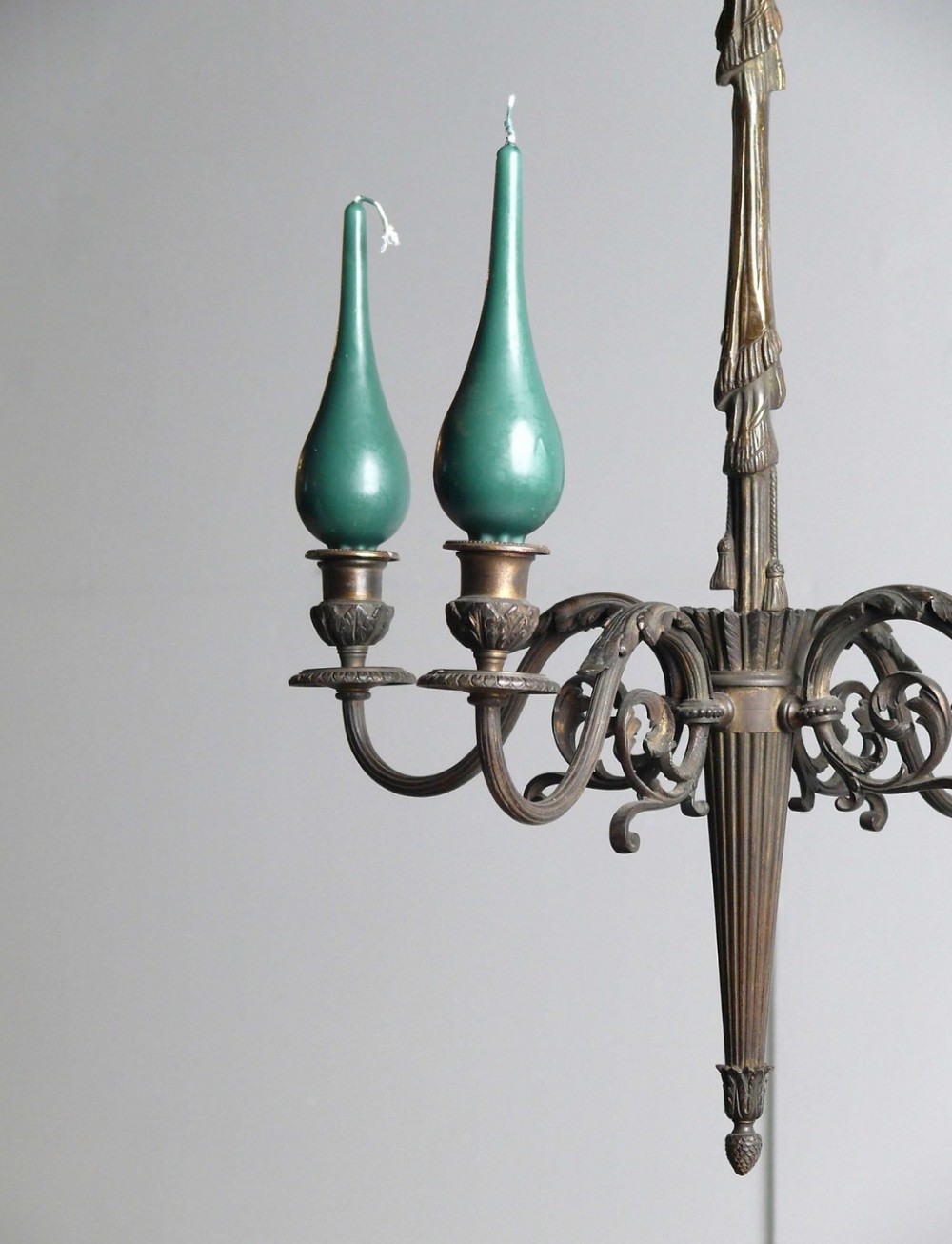 A 19th-century French dark bronze four-arm candle chandelier with scrolling branches, leaf motifs, and a central fluted column. View II