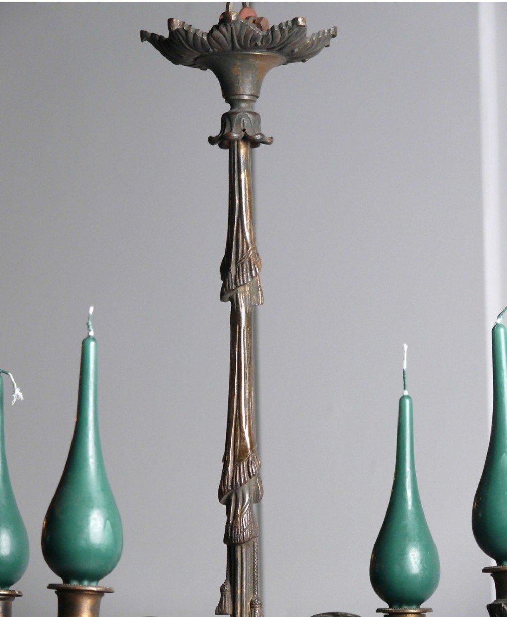 A 19th-century French dark bronze four-arm candle chandelier with scrolling branches, leaf motifs, and a central fluted column. View IV