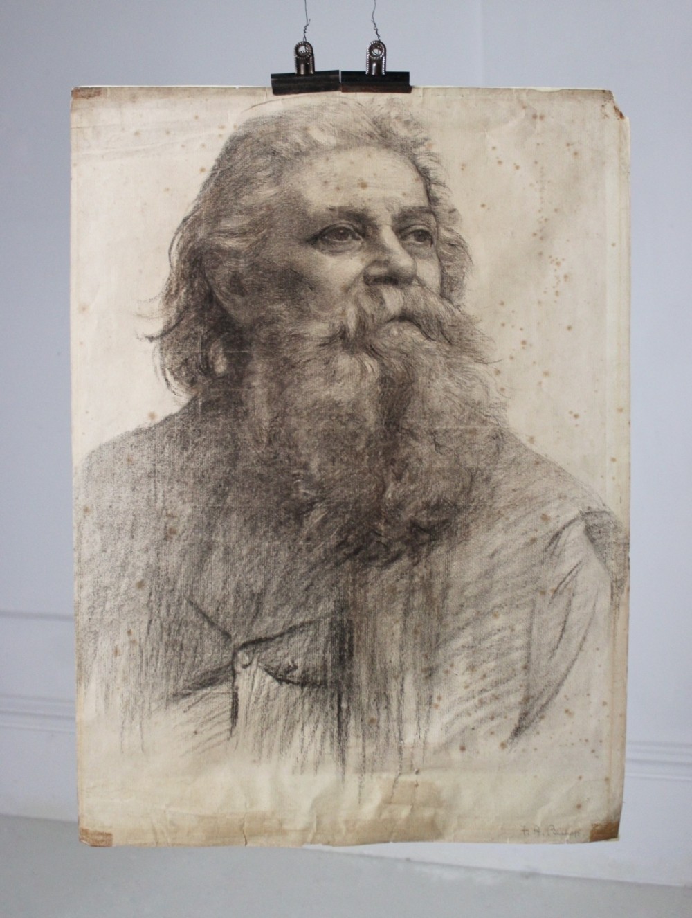 A monochrome charcoal study on paper depicting a bearded gentleman turned in three-quarter profile.