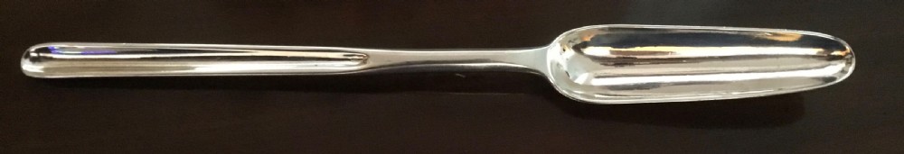An antique Georgian double-ended sterling silver marrow scoop featuring two distinct sizes of elongated channel troughs.