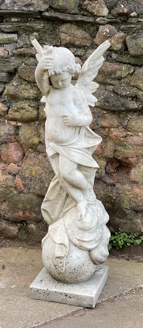 Large Marble Carved Cherub on a Ball Base