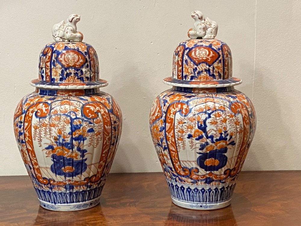 Pair of C19th Imari ovoid jar and covers  View II