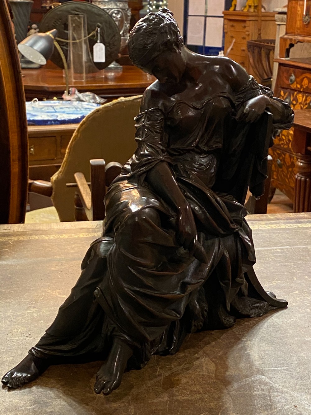C19th large bronze of classical figure reclining in a chair  View II