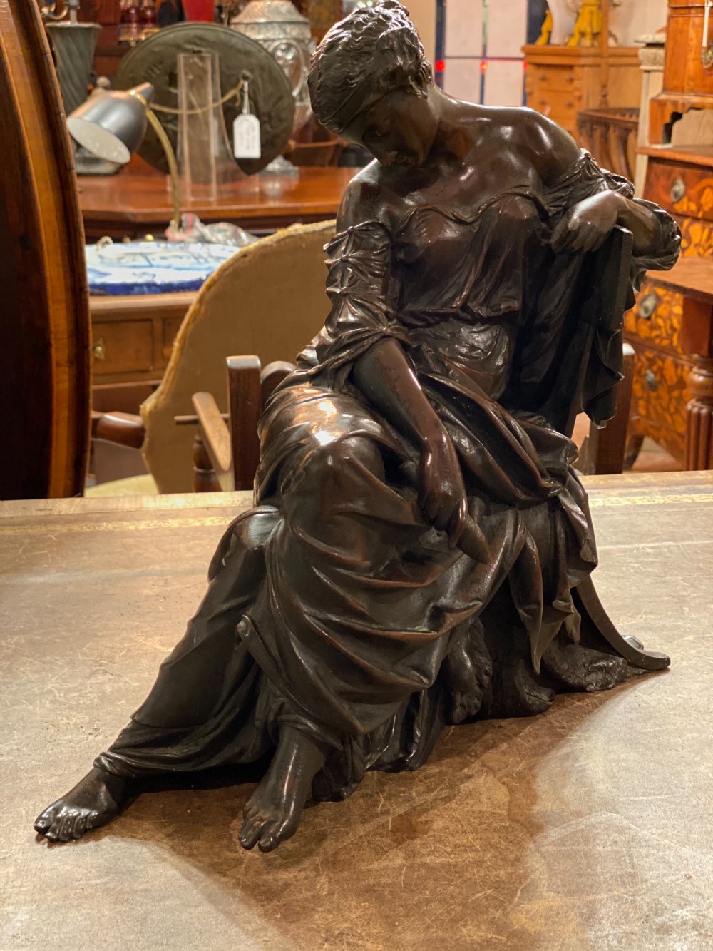 C19th large bronze of classical figure reclining in a chair  View III
