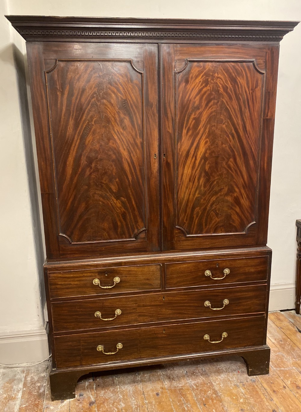 C18th flame Mahogany linen press