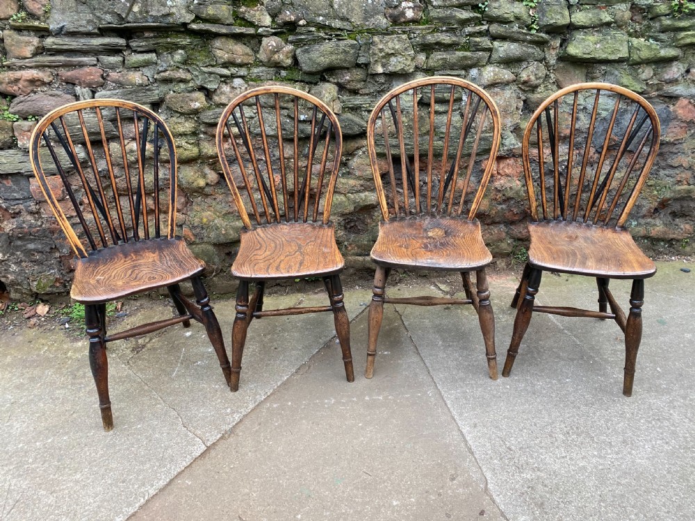 Set of four Windsor stick back chairs 