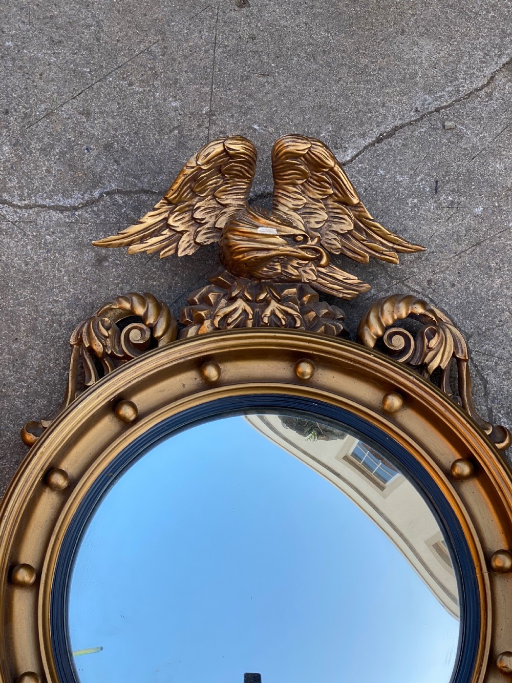  C19th large convex giltwood carved mirror  View II