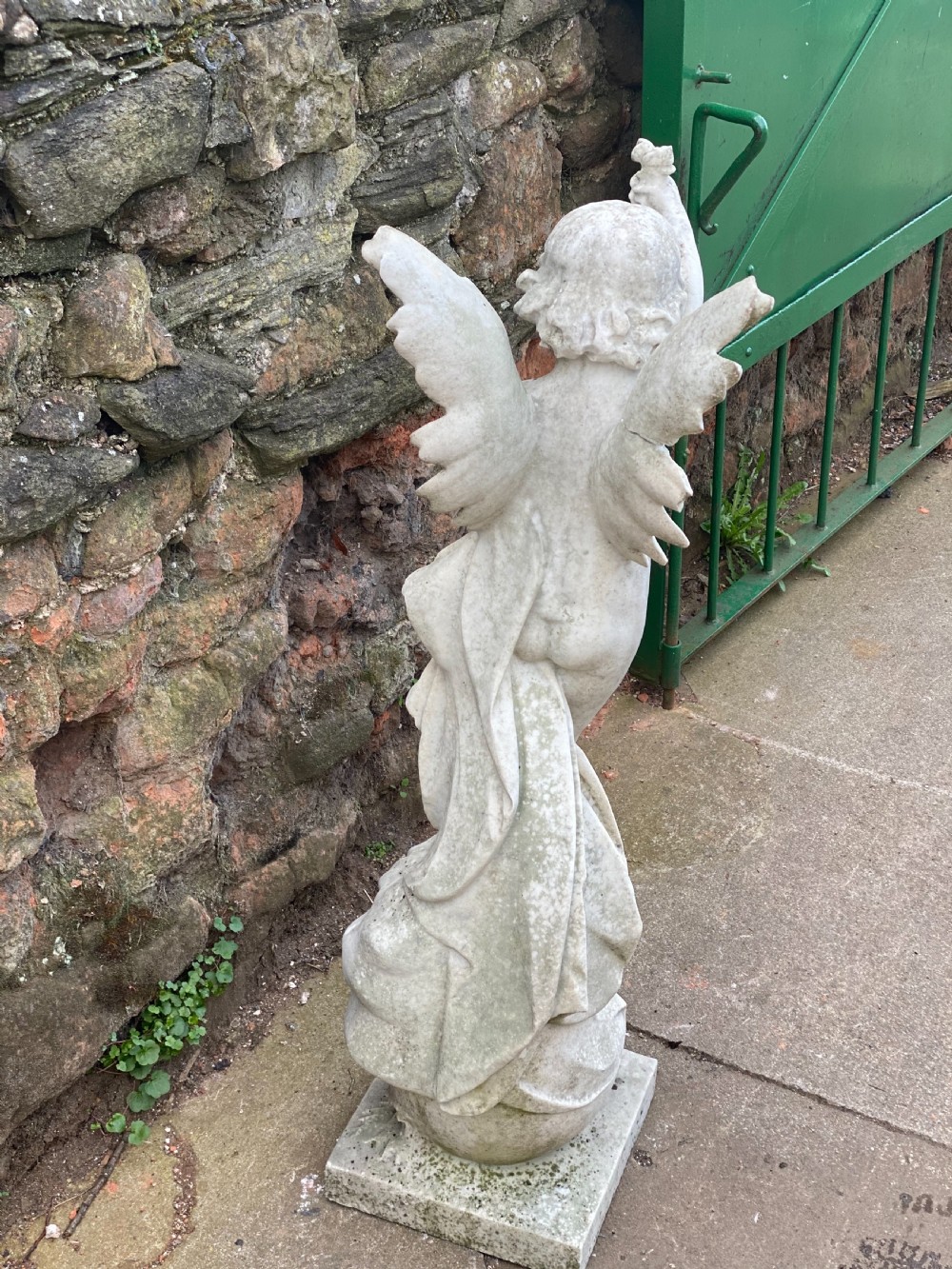 Large marble carved cherub on a ball base  View IV