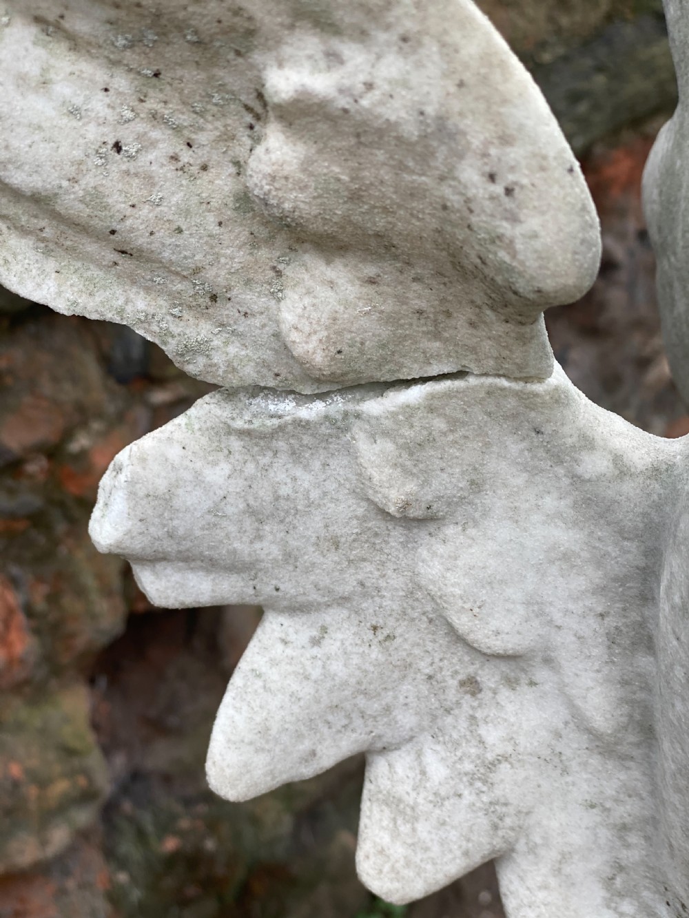 Large marble carved cherub on a ball base  View VII