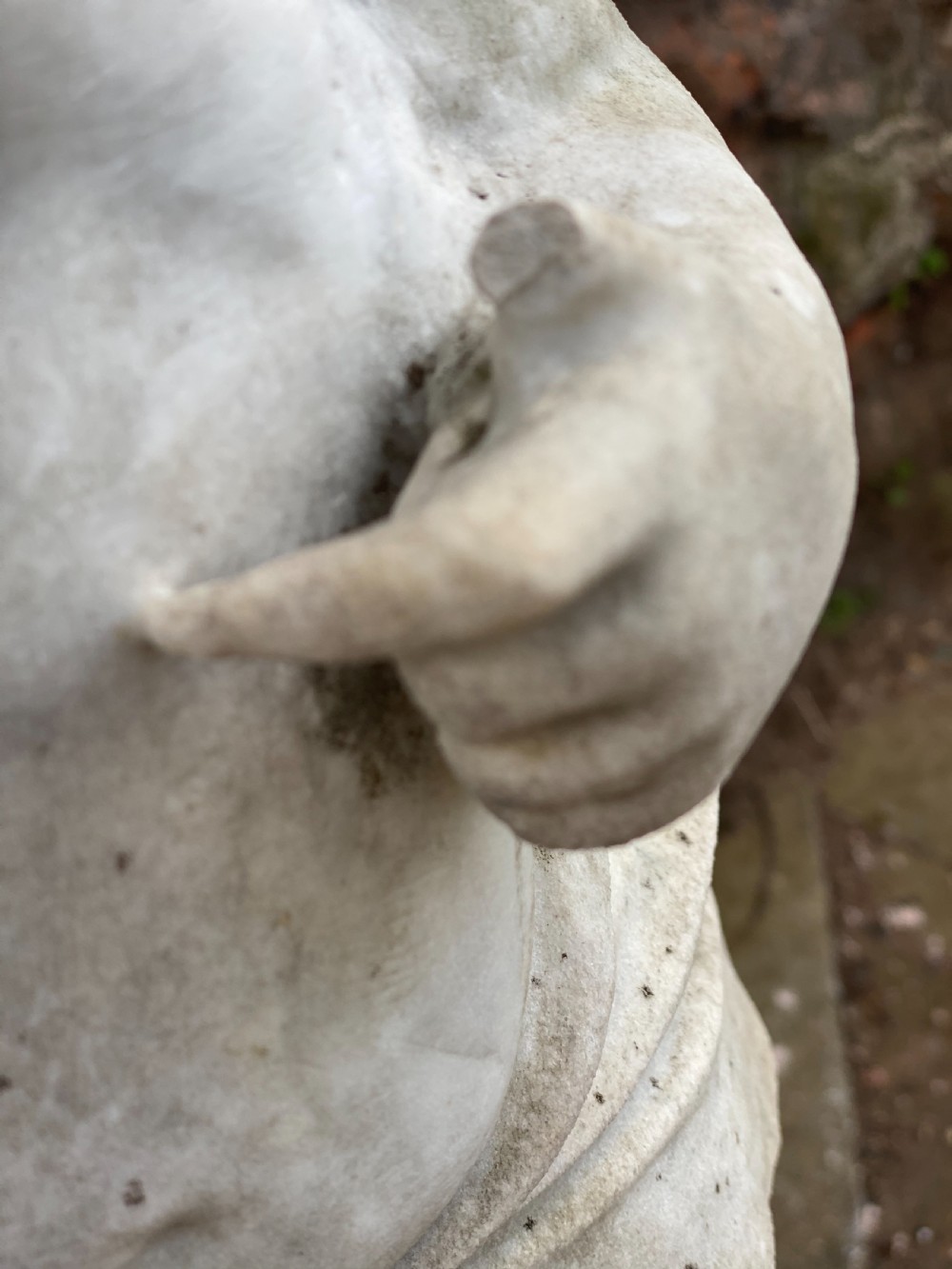 Large marble carved cherub on a ball base  View XI