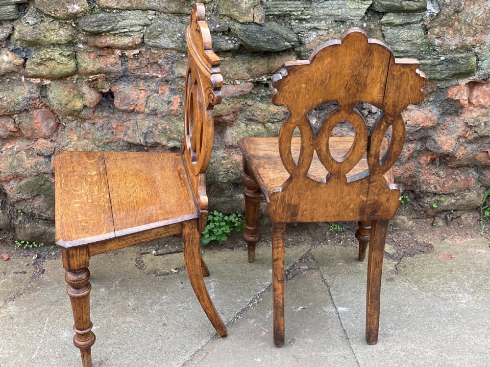 Pair of oak hall chairs with fretwork backs  View IV