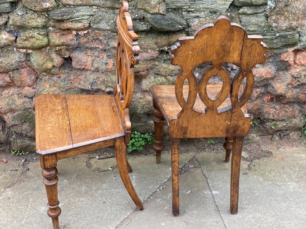 Pair of oak hall chairs with fretwork backs  View V