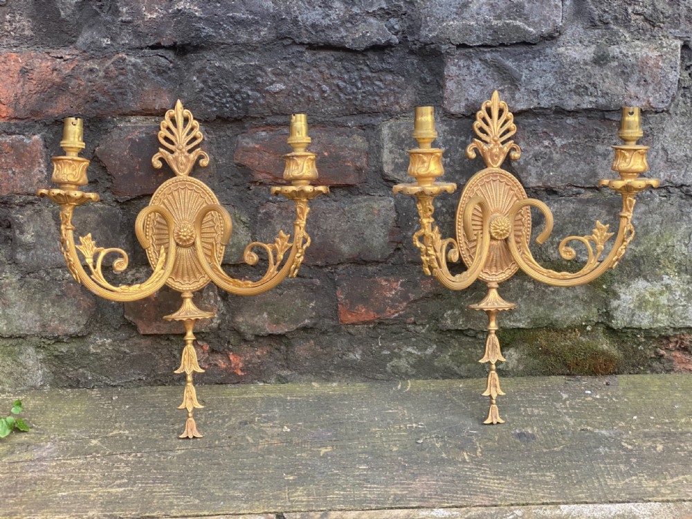 Pair of ormolu wall mounted classical two armed lights 