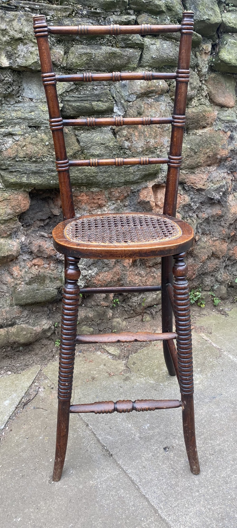 Correctional deportment chair regency in stained beech with caned seat 